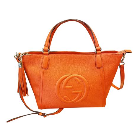 orange Gucci purse